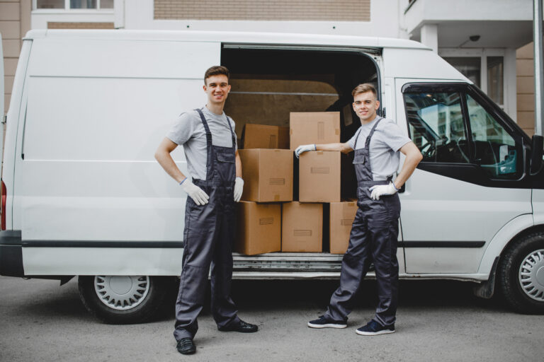Delivery Men Posing In Front Of Moving Van 2026 01 05 00 58 26 Utc 768x512
